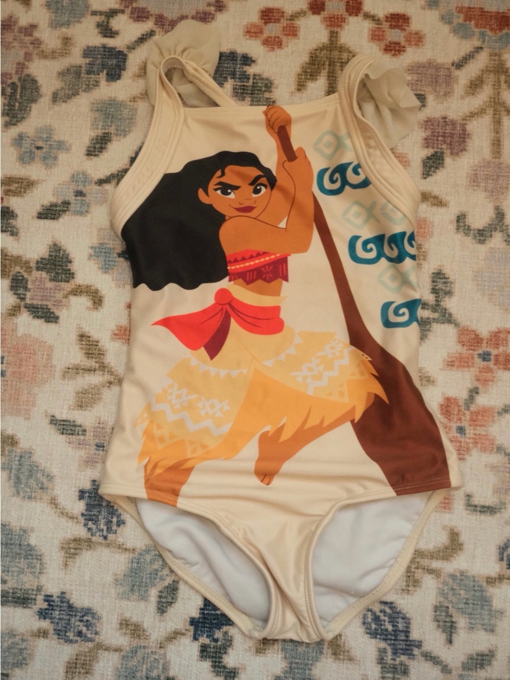 Hanna Andersson Cream One-Piece with Moana Graphic and Red Accents
